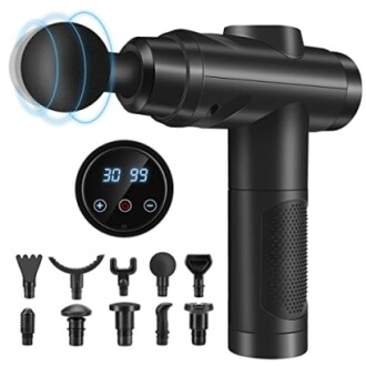 Pistolet de massage portable avec accessoires.